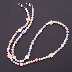 Colorful beaded phone crossbody strap with iridescent rabbit and floral resin beads