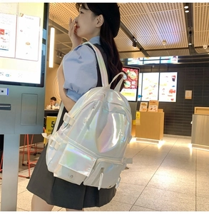 Iridescent laser PU backpack showing side view of buckles and multi-pocket design