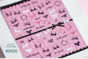 Detailed view of KX020 nail stickers featuring 5D lace lingerie and bowknot designs