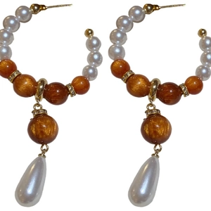 Elegant gold earrings with white and amber resin pearls and teardrop pearl drops