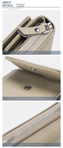 Macro detail of trifold leather wallet with silver metal zipper and snap button