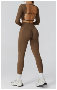 Detail view of seamless yoga set featuring hollow out back design and high waist leggings