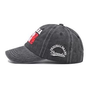 Washed cotton baseball cap with Canada embroidery and vintage distressed finish in dark grey