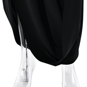 Detail view of the sleek black fabric and high slit design on the sexy backless maxi dress