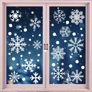 White snowflake window stickers with stars and dots for Christmas glass decoration