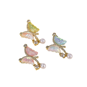 Iridescent butterfly charms with crystals and pearls in varied colorful gradients