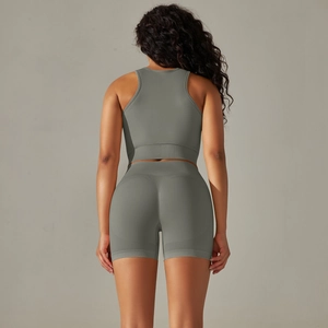 Women seamless grey yoga set with racerback top and high waist lifting shorts back view