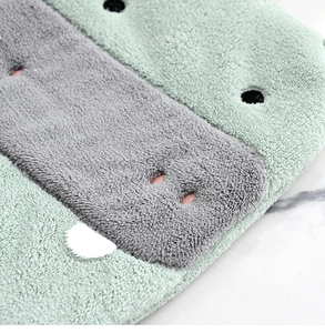 Close-up of cute cartoon animal coral fleece hand towel with ultra-absorbent plush texture