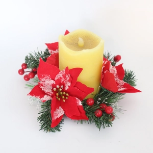 Artificial Christmas candle ring with yellow pillar candle, red flowers and pine needles