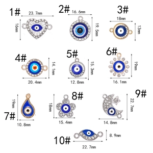 Detailed dimension chart showing various evil eye alloy charms with size measurements