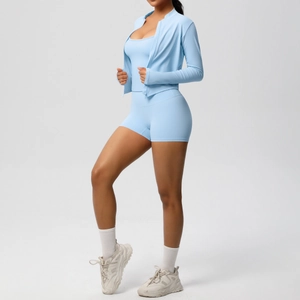 Three-piece light blue yoga set with zipper jacket, sports tank top and high waist shorts