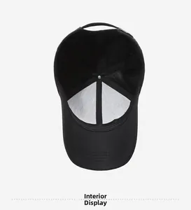 Detailed interior view of a black cotton baseball cap showing lining and stitching