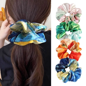 French oil painting print satin scrunchies for women showing model hair and colorful sets