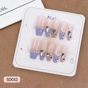 Handmade purple French ballerina press-on nails with silver star and moon rhinestones