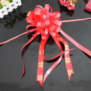 Red and gold double-layered pull bow with Chinese characters for wedding decoration