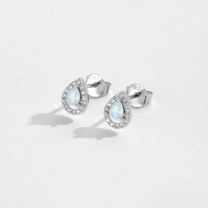 Detail view of S925 silver pear cut stud earrings with opal stone and zircon halo