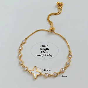 Detail view of 22cm adjustable gold chain bracelet with star charm and 4mm cubic zirconia