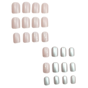 Short square pink and silver dot press-on nails with glitter finish and metallic texture