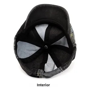 Internal view showing reinforced seams and elastic strap of the washed denim newsboy hat