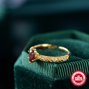 Elegant S925 sterling silver egg-shaped gold plated ring with ruby red center stone