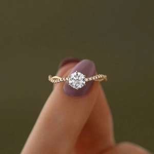 S925 sterling silver wave ring with round brilliant center stone and pavé diamond band