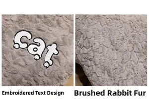 Detail of embroidered cat text on soft plush fabric with brushed flower texture