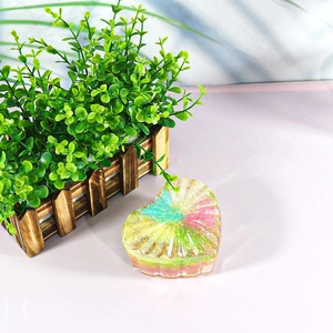 Striped heart-shaped resin storage box with colorful glitter and faceted lid