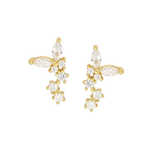 Detailed macro view of gold-plated tassel earrings featuring marquise and round zircon stones