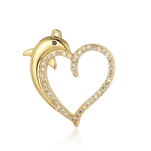 Close-up of a golden dolphin heart pendant with sparkling cubic zirconia stones