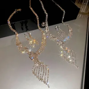 Luxurious leaf-shaped necklace and earring set with shimmering rhinestones and tassels