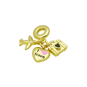 Detail of gold-plated charms featuring an airplane, suitcase, and engraved heart pendant