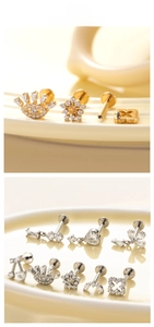 Detailed display of assorted internal thread titanium piercing studs with cubic zirconia