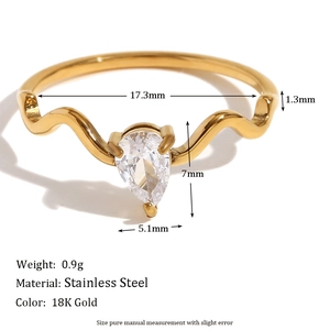 18K gold plated stainless steel wavy ring featuring a pear-cut clear zircon stone