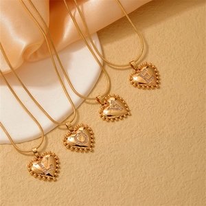 Golden heart pendant necklaces with LOVE letter zircon inlay on chic snake chains