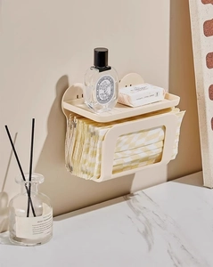 Detail showing beige wall-mounted tissue box storage shelf with two-tier design