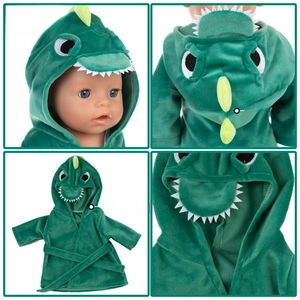 Detail view of 18 inch doll green dinosaur pajamas featuring soft plush fabric and hood