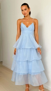 Detail of light blue organza multi-layer tiered cake dress with elegant V-neckline