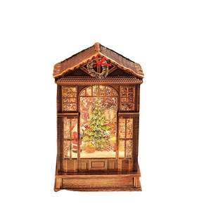 Vintage style Christmas LED music box lantern with an illuminated winter snow scene