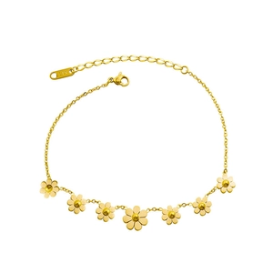 Minimalist daisy anklet in gold stainless steel with adjustable chain on white background