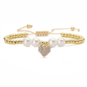 Elegant 18K gold plated heart pendant bracelet with white pearls and adjustable beige cord