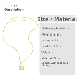 Detail of gold heart lock pendant necklace with cubic zirconia micro-pave setting