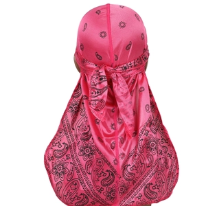 Rear view detail of a pink paisley satin durag showing the tail and stitching quality