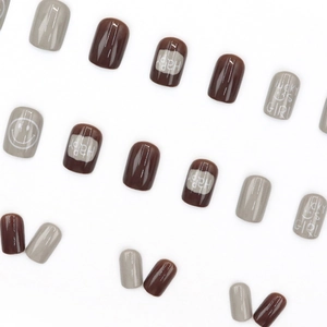 Brown and grey square press-on nails with Happy and Lucky Girl letter patterns