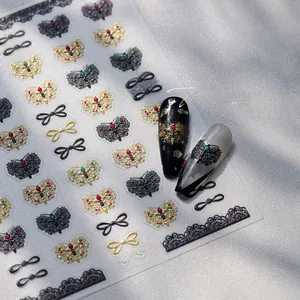 Detail view of M-915 nail art stickers featuring vintage gold and black lace butterfly patterns