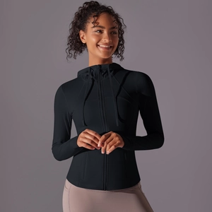 Close-up of black athletic sun protection jacket featuring thumb holes and zipper detail