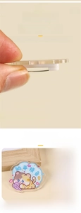Detail of 4mm thick acrylic badge showing sandwich printing and lazy cat design