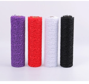Detail of multi-colored floral mesh wrap rolls for bouquet decoration and DIY crafts