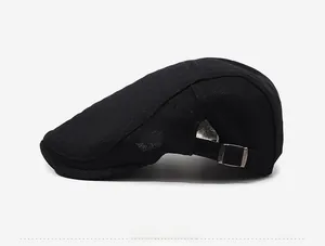 Side view of black mesh flat cap with adjustable metal buckle and breathable texture