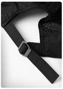 Detail of adjustable back strap on black quick-dry sport cap with mesh fabric.