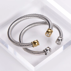 7mm wide twisted cable steel open cuff bracelet with cubic zirconia in silver and gold